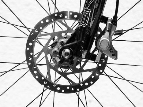 Close-up of eBike brake disc maintenance