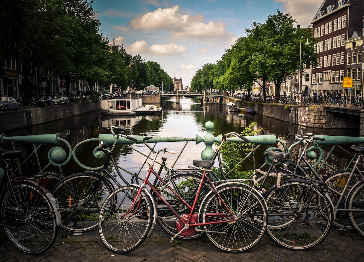 European city bikes parked along river - Commuter eBike guide