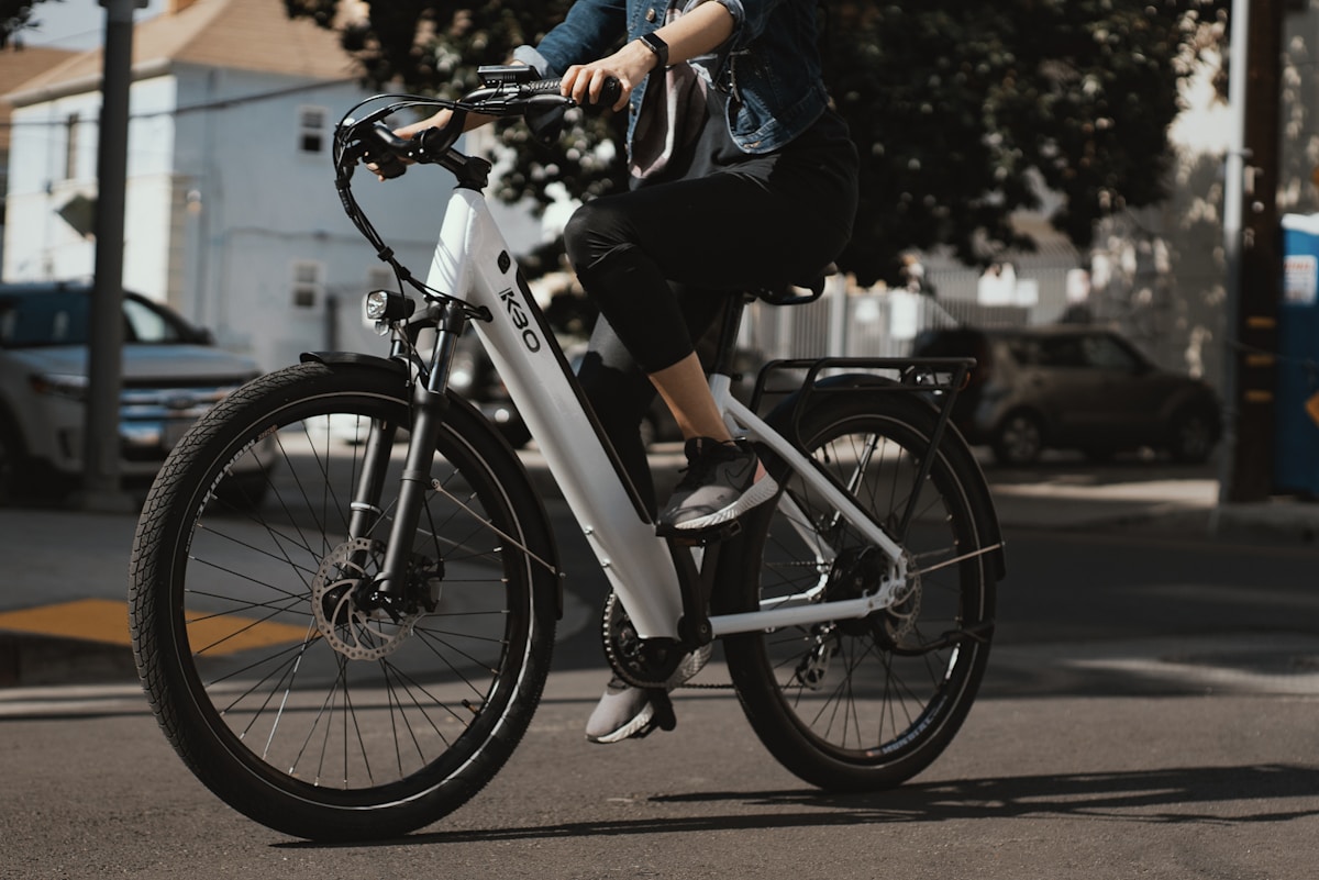 Man riding bicycle in city - Budget eBike guide